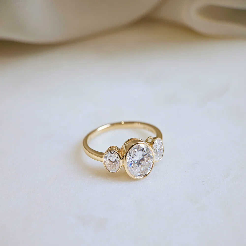14K Bezel Triology Moissanite Ring