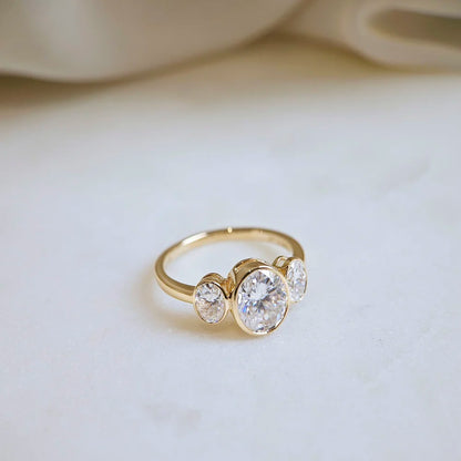 14K Bezel Triology Moissanite Ring