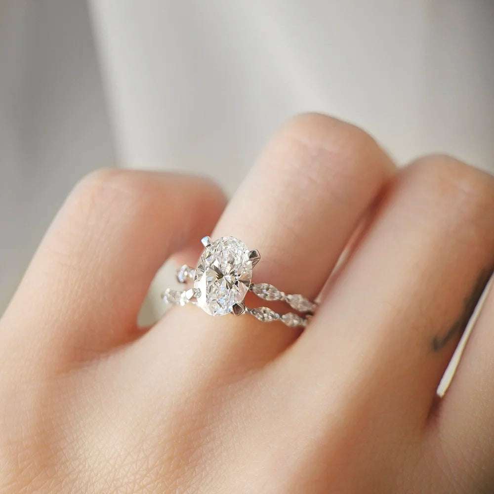 18K Odette Solitaire Oval Moissanite Ring with Round & Marquise Band