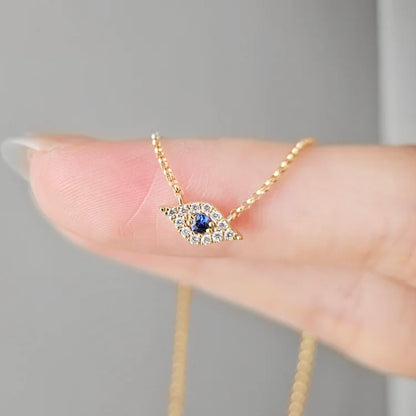 Blue Sapphire and Diamond Evil Eye Necklace
