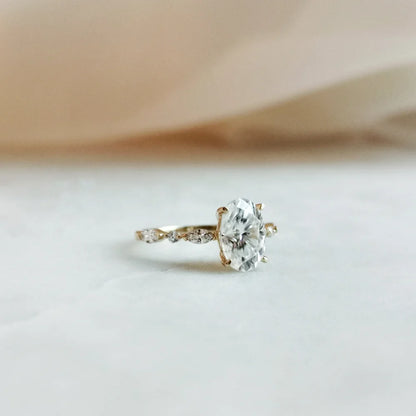 18K Odette Solitaire Oval Moissanite Ring with Round & Marquise Band