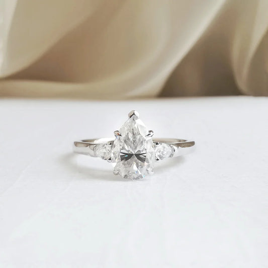 18K "The Trilogy" Pear Moissanite Ring