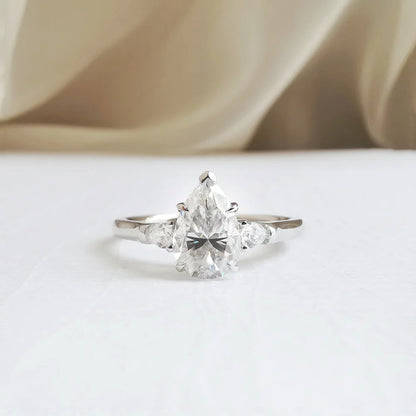 18K "The Trilogy" Pear Moissanite Ring