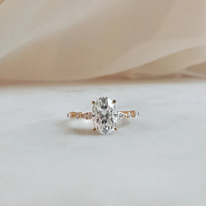 18K Odette Solitaire Oval Moissanite Ring with Round & Marquise Band