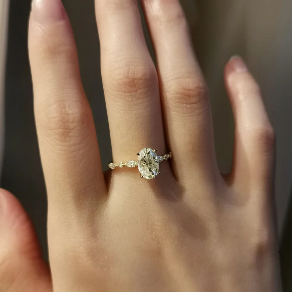 18K Odette Solitaire Oval Moissanite Ring with Round & Marquise Band
