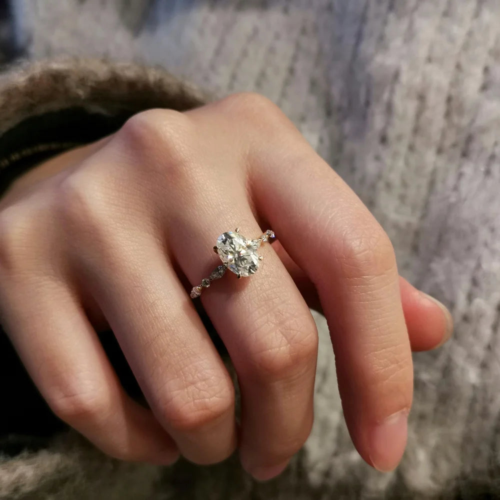 18K Odette Solitaire Oval Moissanite Ring with Round & Marquise Band