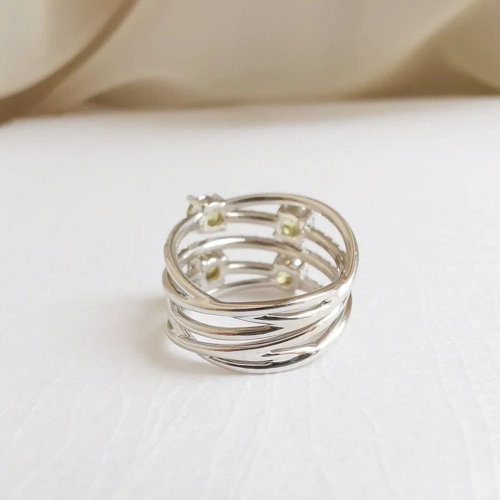 The Warped and Wrapped Demantoid Garnet Ring