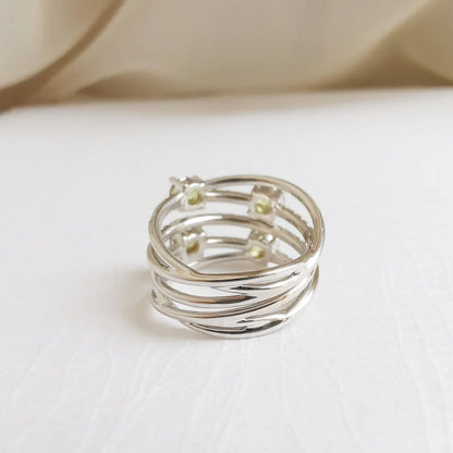 The Warped and Wrapped Demantoid Garnet Ring