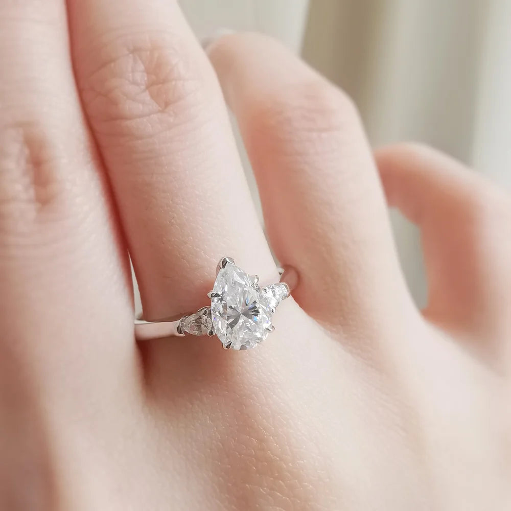 18K "The Trilogy" Pear Moissanite Ring