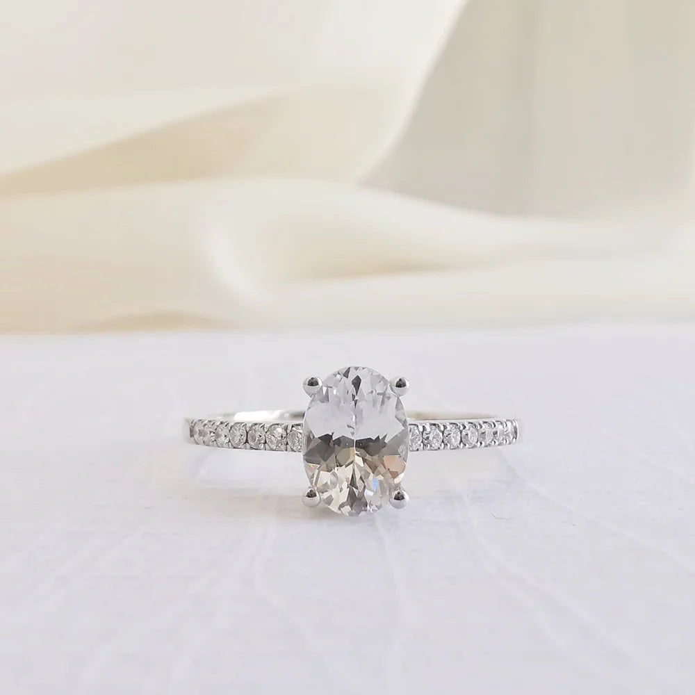 White Sapphire Ring with Diamond Wraps