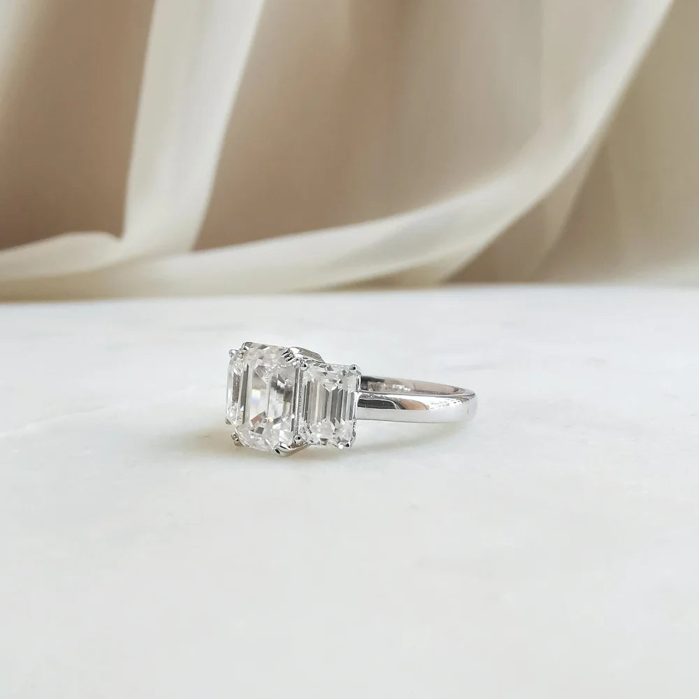18K Mia Trilogy Emerald Cut Moissanite Ring