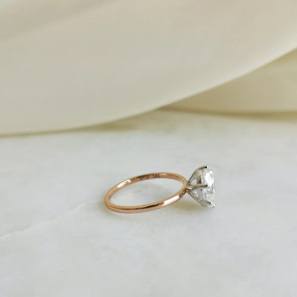 Classic Six Claw Oval Moissanite Ring