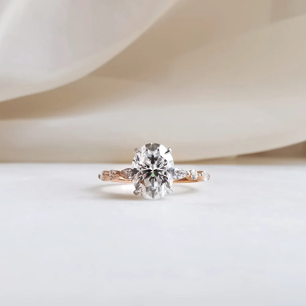 18K Odette Solitaire Oval Moissanite Ring with Round & Marquise Band