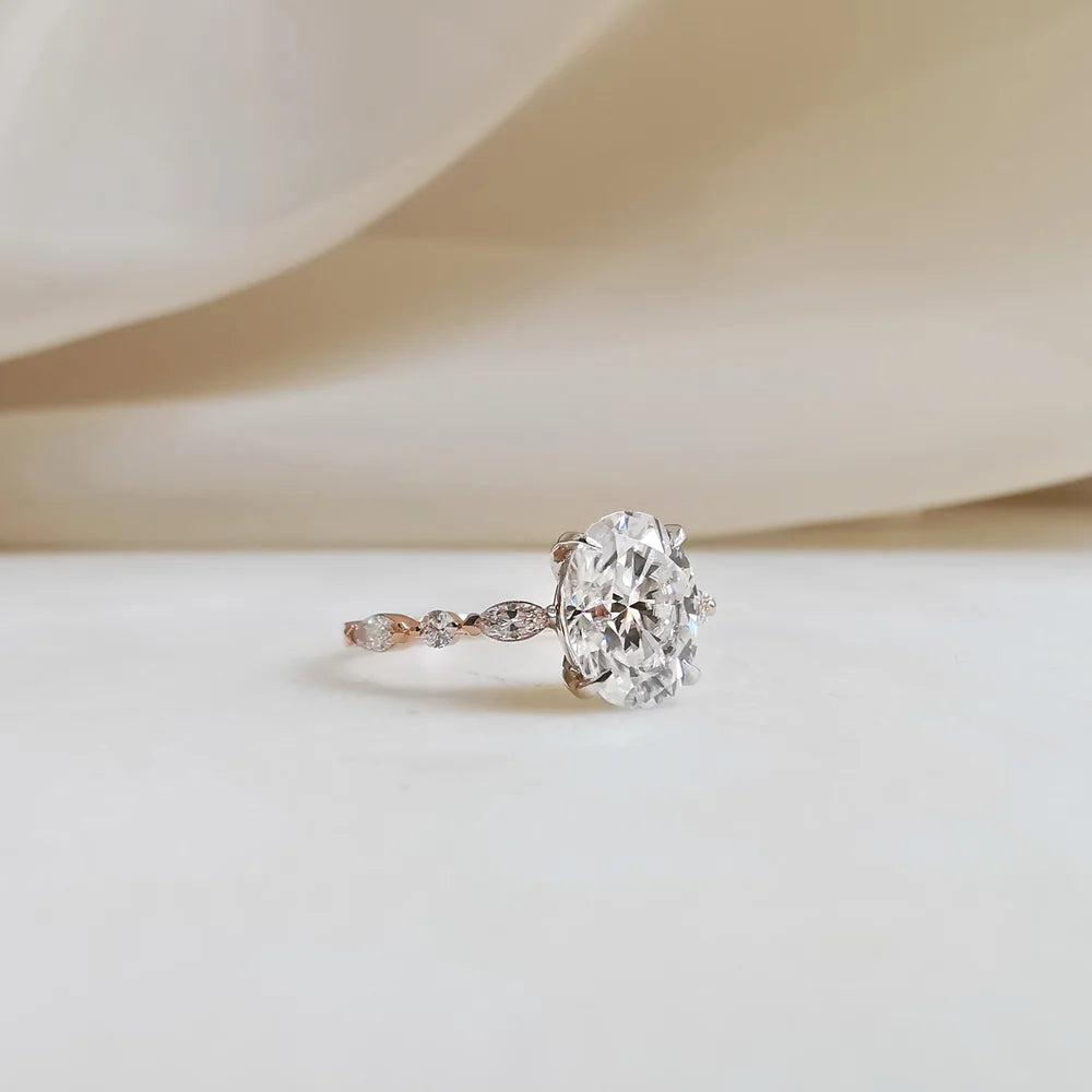 18K Odette Solitaire Oval Moissanite Ring with Round & Marquise Band