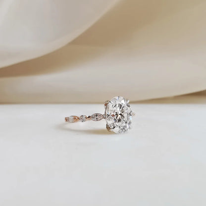 18K Odette Solitaire Oval Moissanite Ring with Round & Marquise Band