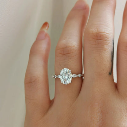 18K Odette Solitaire Oval Moissanite Ring with Round & Marquise Band