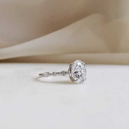 18K Odette Solitaire Oval Moissanite Ring with Round & Marquise Band