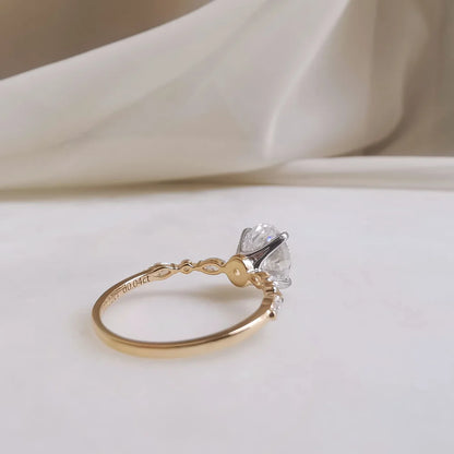 18K Peyton Solitaire Oval Moissanite Ring with Round & Marquise Band
