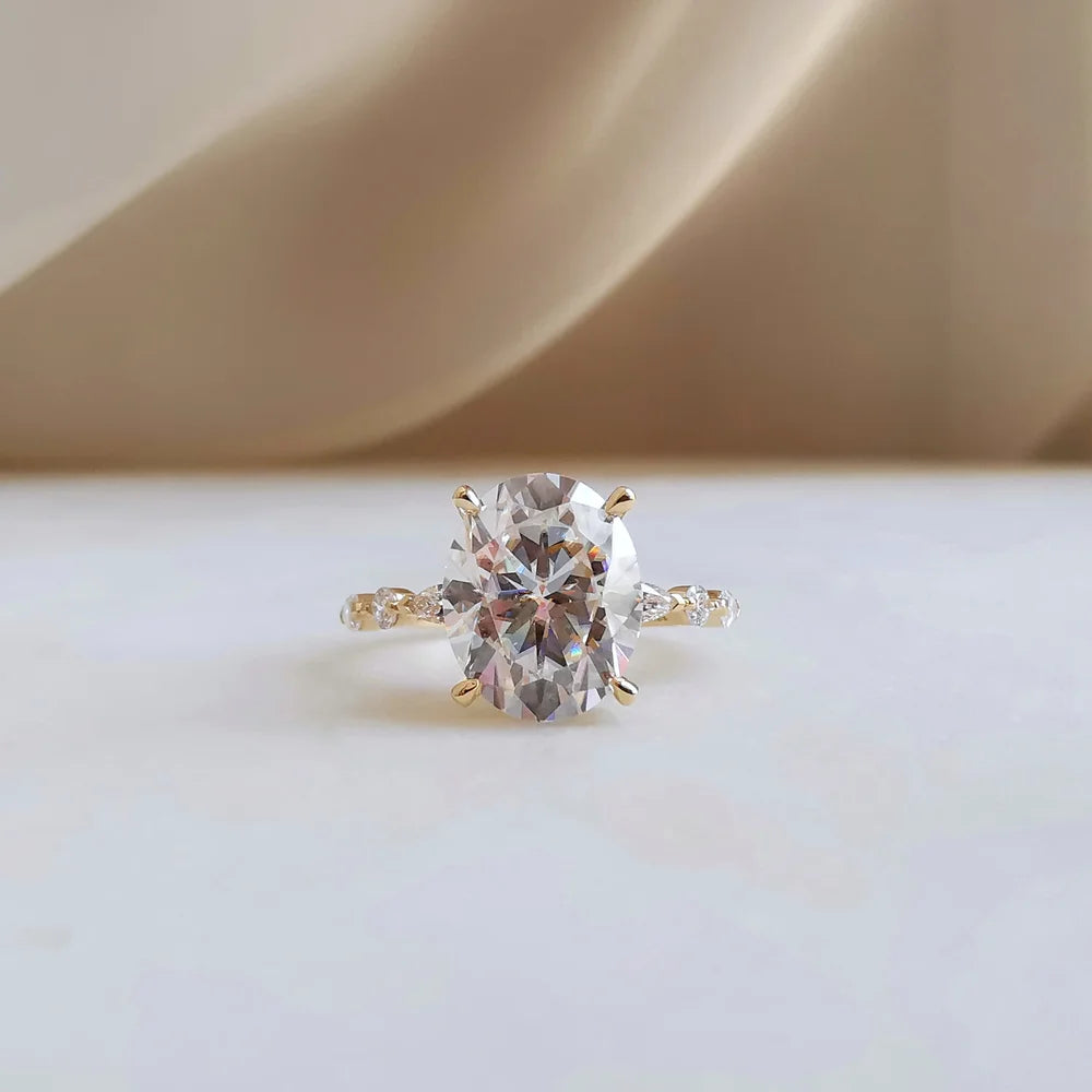 18K Odette Solitaire Oval Moissanite Ring with Round & Marquise Band