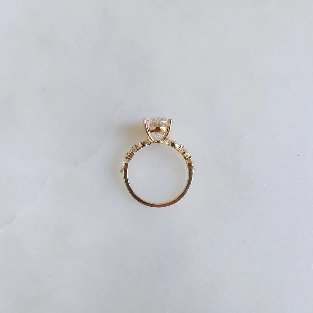 18K Odette Solitaire Oval Moissanite Ring with Round & Marquise Band
