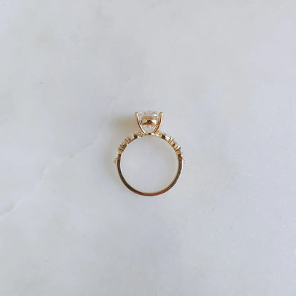 18K Odette Solitaire Oval Moissanite Ring with Round & Marquise Band