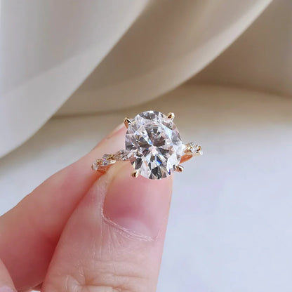 18K Odette Solitaire Oval Moissanite Ring with Round & Marquise Band