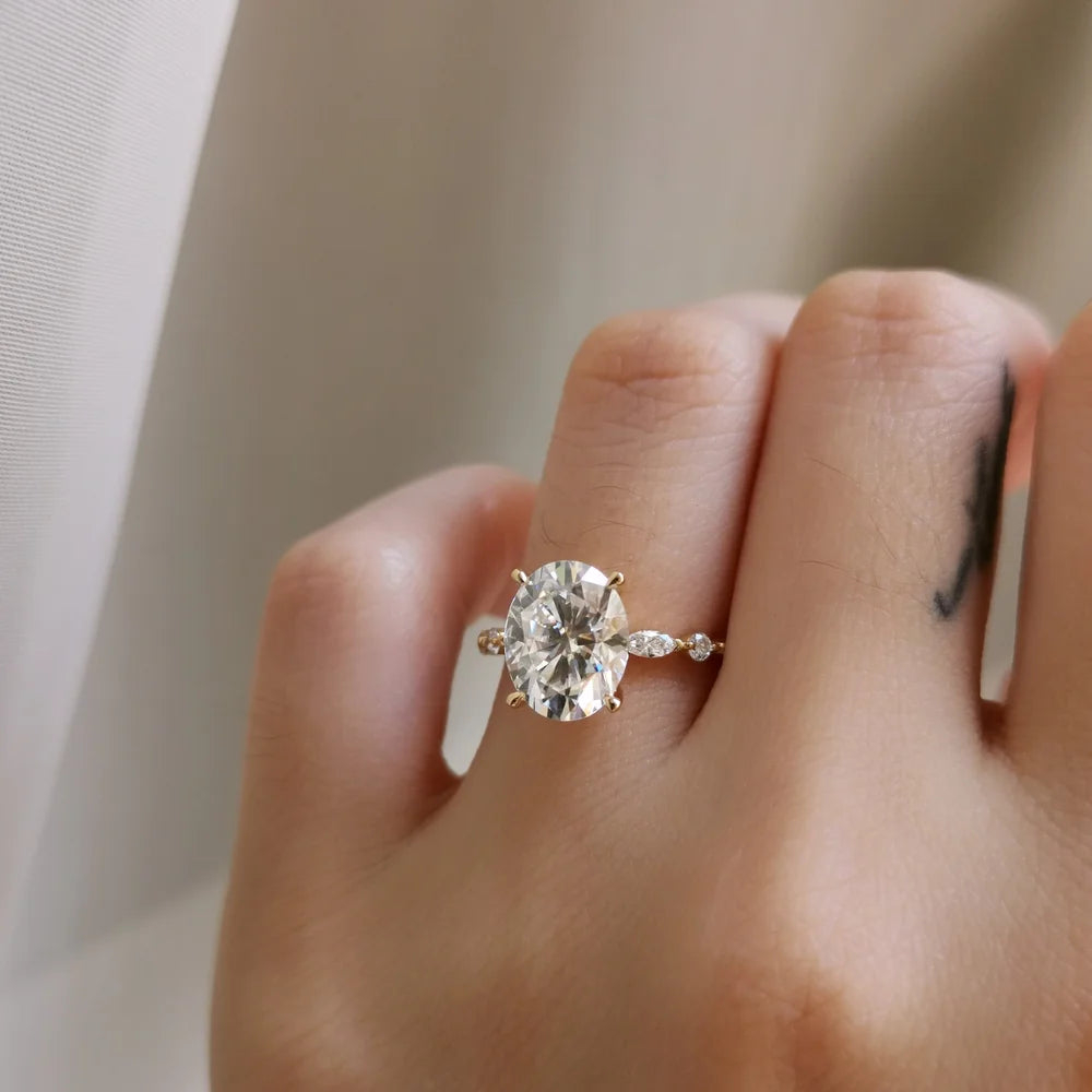 18K Odette Solitaire Oval Moissanite Ring with Round & Marquise Band
